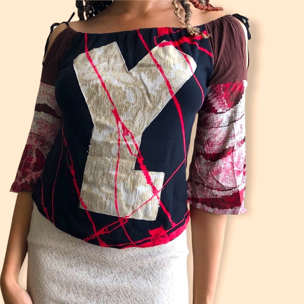 Super cute Custo Barcelona blouse with an off the shoulder cutout tie design